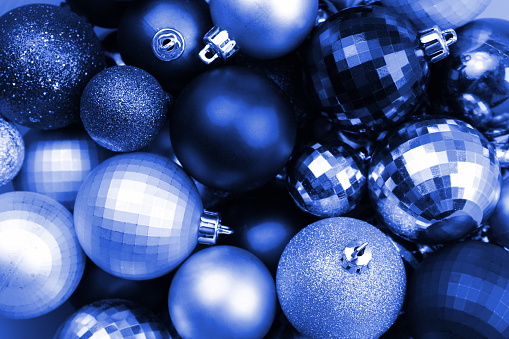 Texture of Christmas balls in one pile of blue.