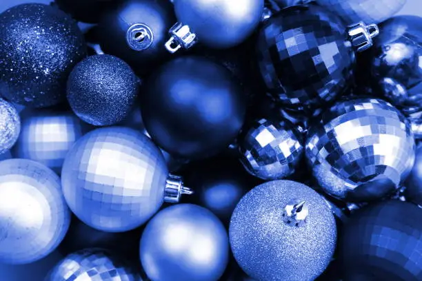 Texture of Christmas balls in one pile of blue.