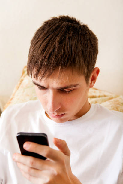 istock Young Man with a Phone 1403630245