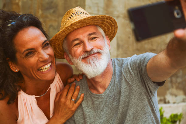 istock Mature couple taking selfie 1403631895