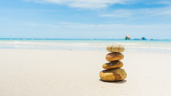 Stones balanced on beach. Zen stones meditation and relaxation. Japanese zen garden