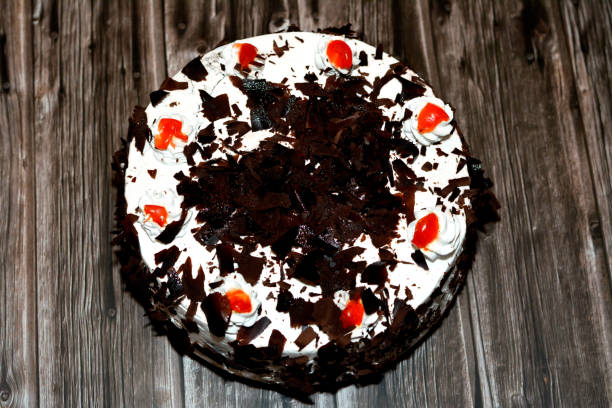 istock A black forest cake, a light chocolate sponge cake, soaked with cherry syrup and cherry brandy (Kirsch), then layered with whipped cream and cherries 1403636317