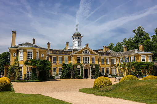 Great Bookham, UK-June 16, 2022: The scenic view of Polesden Lacey house. Polesden Lacey is an Edwardian house and estate, located on the North Downs at Great Bookham, near Dorking, Surrey, England.
