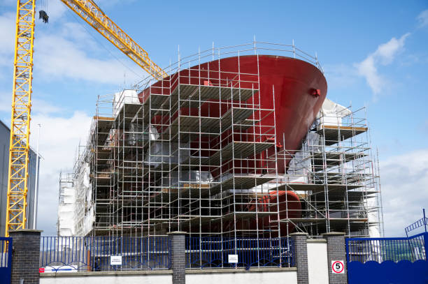 istock Shipbuilding and crane during ferry construction surrounded by scaffold 1403637468