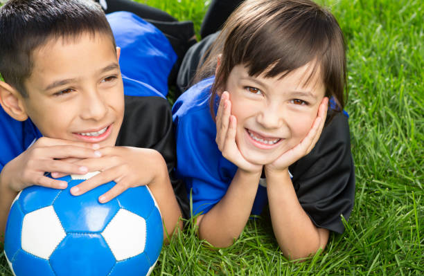 istock Happy Sibling soccer portrait 1403638487