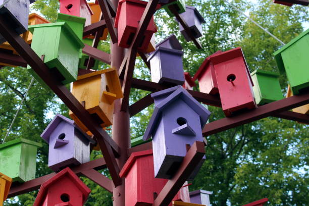 istock An iron tree stands with many birdhouses. 1403642060