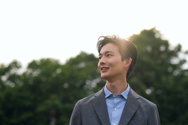 Portrait of businessman in backlight