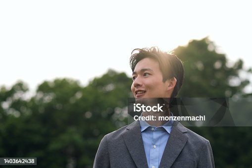 istock Portrait of businessman in backlight 1403642438