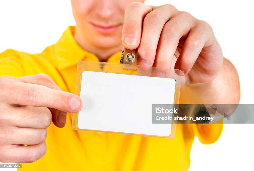 Man show a Badge Man shows the Blank Badge on the White Background 20-24 Years Stock Photo