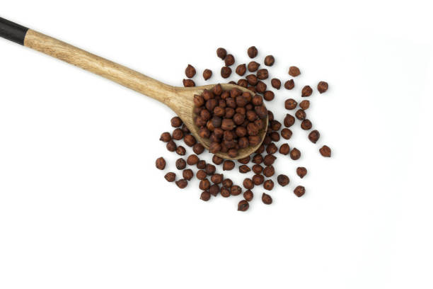 istock heap of black chickpeas on white background, top view 1403642649