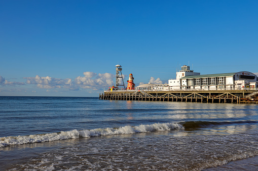 Bournemouth, UK – May 30, 2022: The scenic view of Bournemouth beach and the pier.