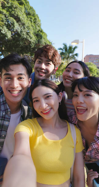 istock young asian people take selfie 1403645961