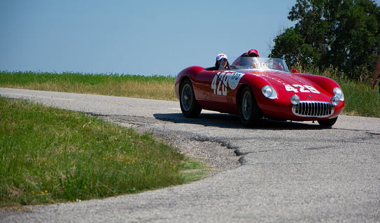 URBINO, ITALY - JUN 16 - 2022 : O.S.C.A. MT 4 1500 2AD 1954 on an old racing car in rally Mille Miglia 2022 the famous italian historical race (1927-1957)