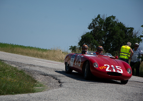 URBINO, ITALY - JUN 16 - 2022 : O.S.C.A. S 750 1956 on an old racing car in rally Mille Miglia 2022 the famous italian historical race (1927-1957)