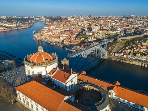 Aerial view of Serra do Pilar Monastery and Dom Luis Bridge in Porto at morning, Portugal