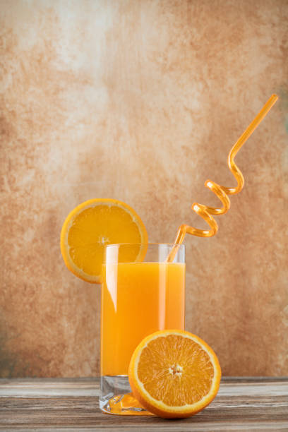 fresh orange juice and sliced fruit on table - healthy eating profile tropical fruit fruit imagens e fotografias de stock