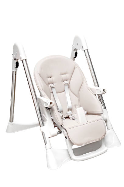 istock Child high chair eating 1403652742