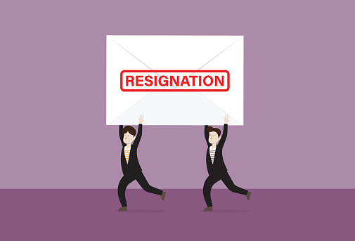 The employees hold a resignation envelope