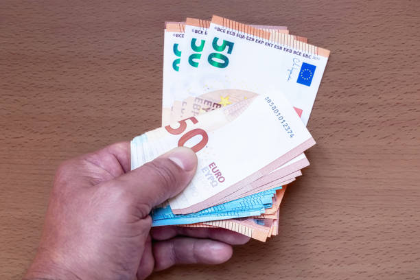 istock Euro banknotes in the hand 1403658104