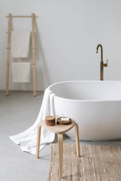 istock Part of classic bathtub in modern interior bathroom 1403658451