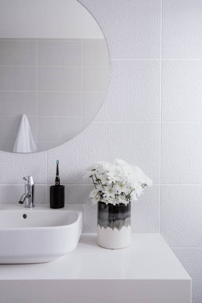 istock Modern bathroom in white tones style with sink and mirror 1403658846