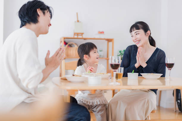 istock Family eating lunch in the dining room 1403666310