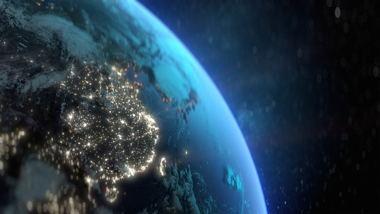 Planet Earth at night with city light illumination. View from space. 3D render