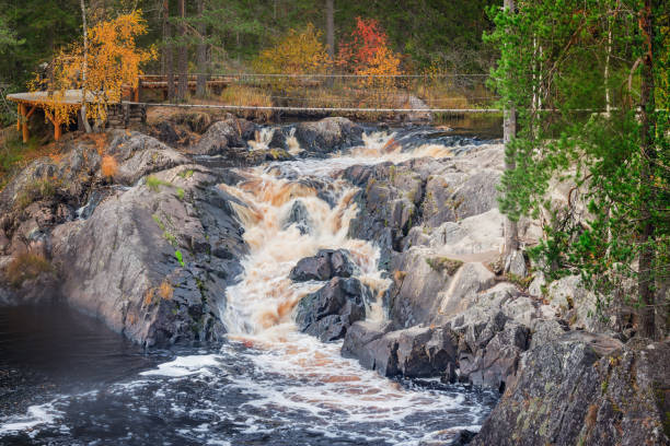 istock Waterfall in the canyon. Ruskeala Mountain Park. 1403668211