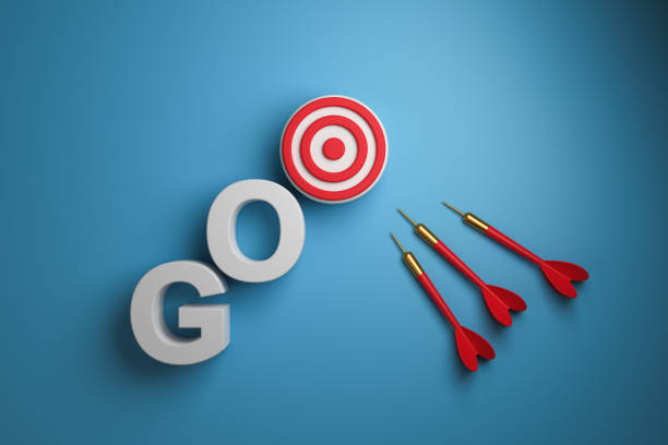 istock 3D volumetric text GO with target and dart on a blue background. 1403675338