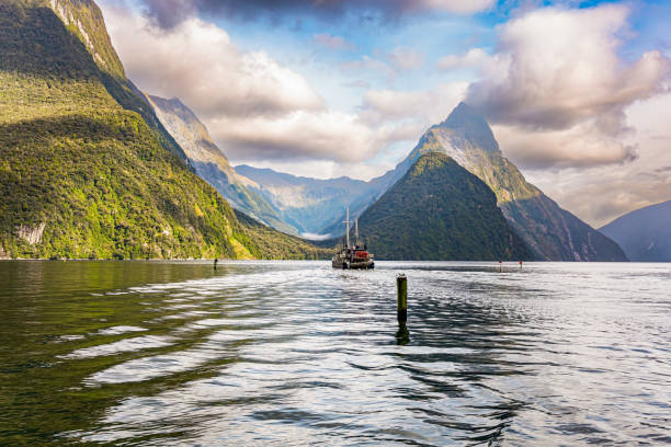 istock Tourist boat in the smooth water 1403678694