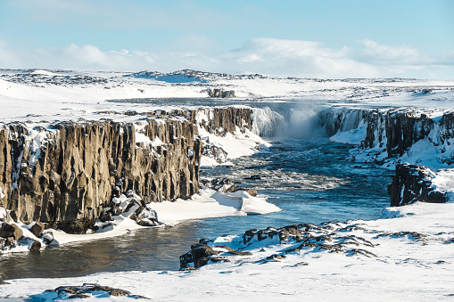 The Selfoss is an 11-meter-high and approximately 100-meter-wide waterfall in the glacial river Jökulsá á Fjöllum in northern Iceland. The origin of this river is in the Vatnajökull glacier, so the amount of water is very variable. Just downstream is Europe's most powerful waterfall, the Dettifoss.