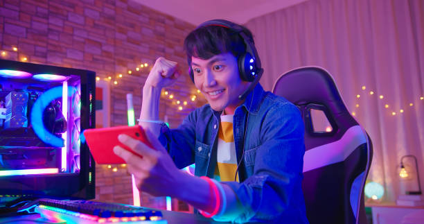 istock esport gamer plays mobile game 1403681674