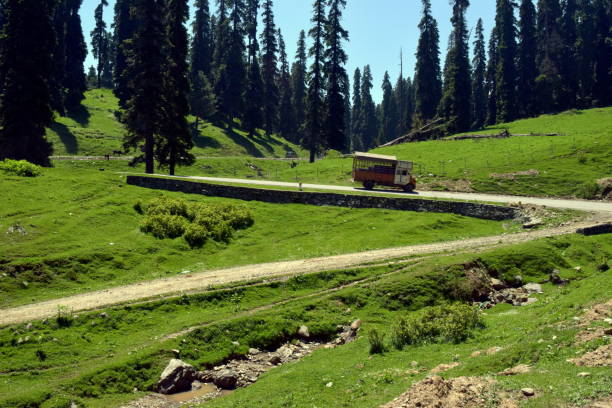 istock A truck climbing down on a curvy road 1403682654