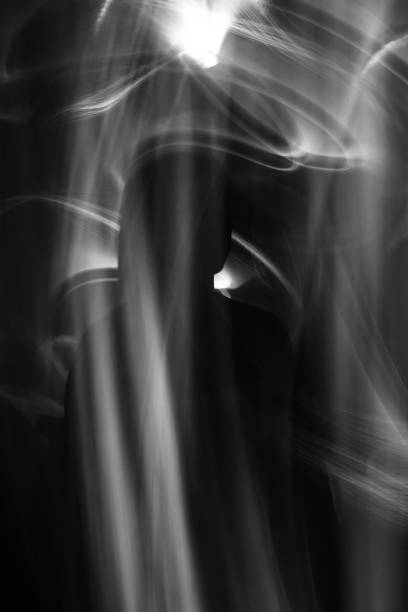 istock Abstract human silhouette in light trails of light painting 1403684517