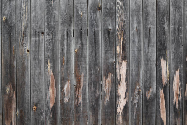 istock Old weathered wooden fence background . Rustic style wood texture 1403688052