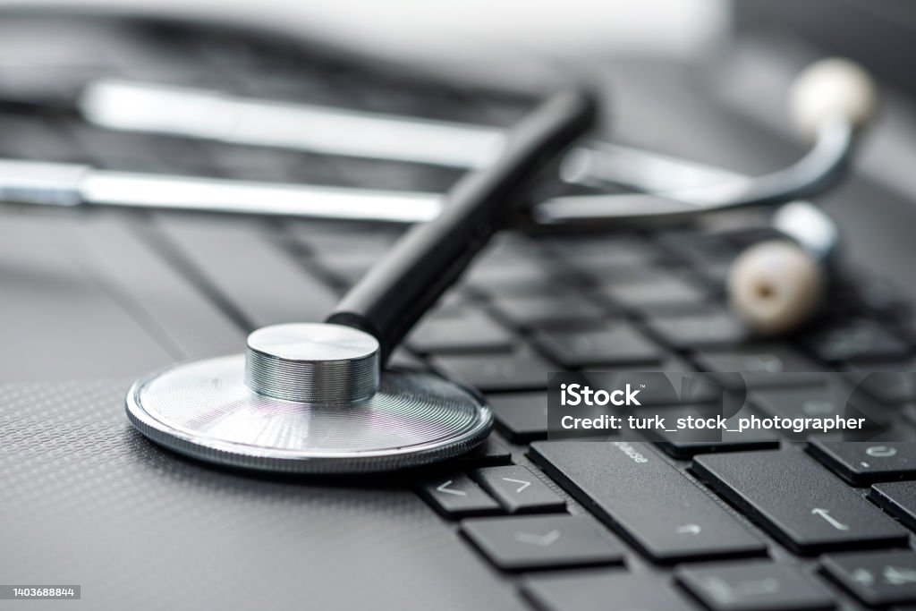 Stethoscope on laptop keyboard. Healthcare And Medicine Concepts Collection Stock Photo