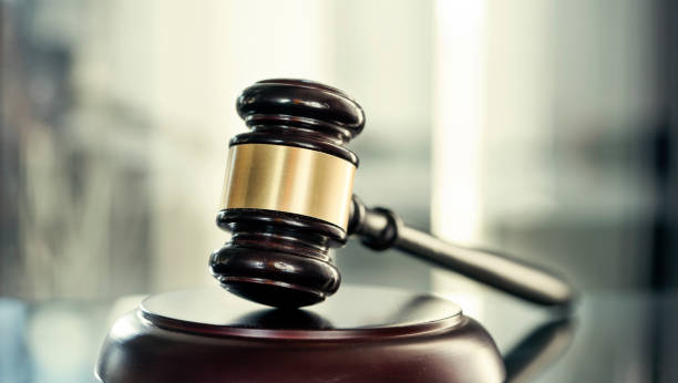 istock Gavel of justice on blurred background 1403690189