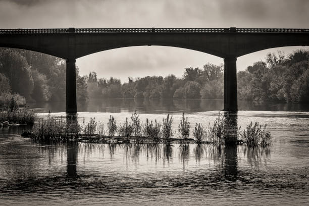 istock bridge over the Dordogne in black and white 1403692297