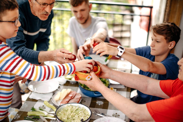 Multi Generation Family having lunch together