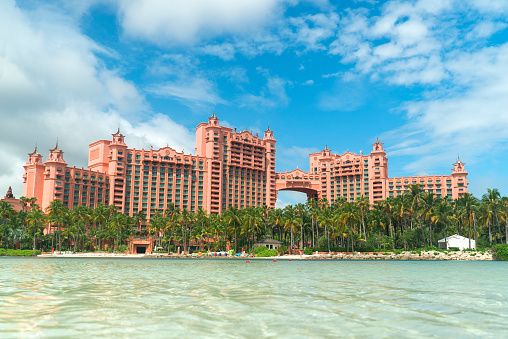 Nassau, Bahamas – June 05, 2022:  View of the iconic pink Royal Tower at the Atlantis resort on Paradise Island, Bahamas.
