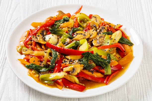 istock Stir Fry Vegetables on white plate, top view 1403698352
