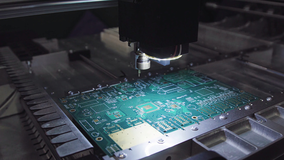 Printed circuit boards production factory. Technological process. Microchip production factory. Production of electric boards at factory.