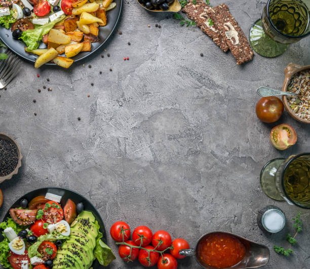istock Vegetarian dinner - fried potatoes and fresh vegetable salad 1403706586