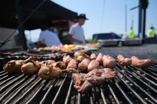 istock Roasting juicy meat steak with spices in burning charcoals fire on bbq grid 1403708902