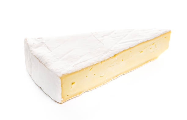 istock Piece of camembert cheese on white 1403714259