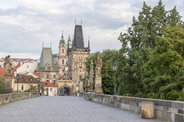 View from Charles bridge in Mala Strana quarter. Prague, Czech RepublicSunrise time, empty streets.
