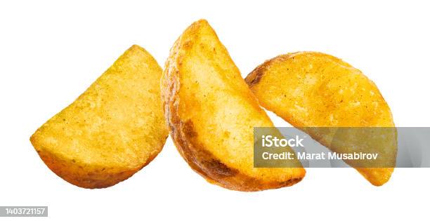 Three Delicious Potato Wedges On White Stock Photo - Download Image Now - Baked, Close-up, Color Image