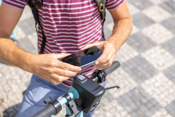 istock Activating electric scooter from smart phone 1403722167