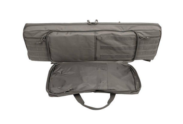 istock Soft light beige gun case with extra pockets. Bag for storing and transporting weapons. Isolate on a white background. 1403724234