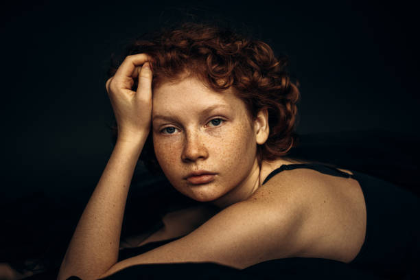 istock beautiful woman with freckles 1403725588